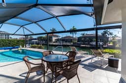 Charming 4 Bed Waterfront Escape w/ Heated Pool and Dock - Image 4