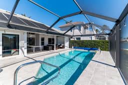 Charming 4 Bed Waterfront Escape w/ Heated Pool and Dock - Image 5
