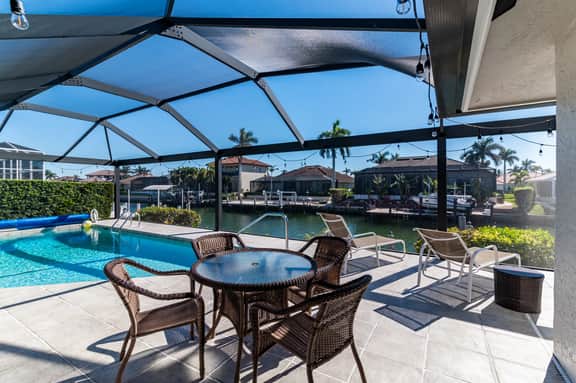 Charming 4 Bed Waterfront Escape w/ Heated Pool and Dock - Image 4
