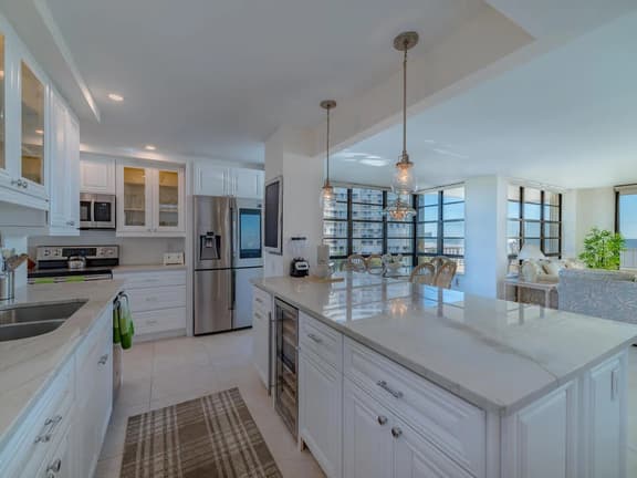 End Unit w/ Top of Line Finishes / Crazy Wide Gulf Views! - Image 1